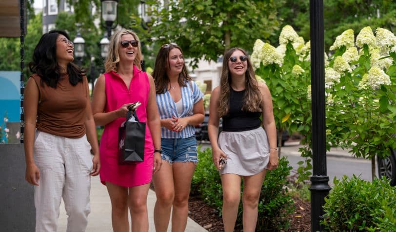 Women walking outdoors in Birkdale Village shopping area