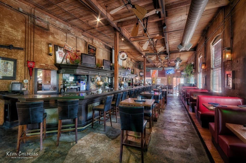 Bar and dining area interior with booths