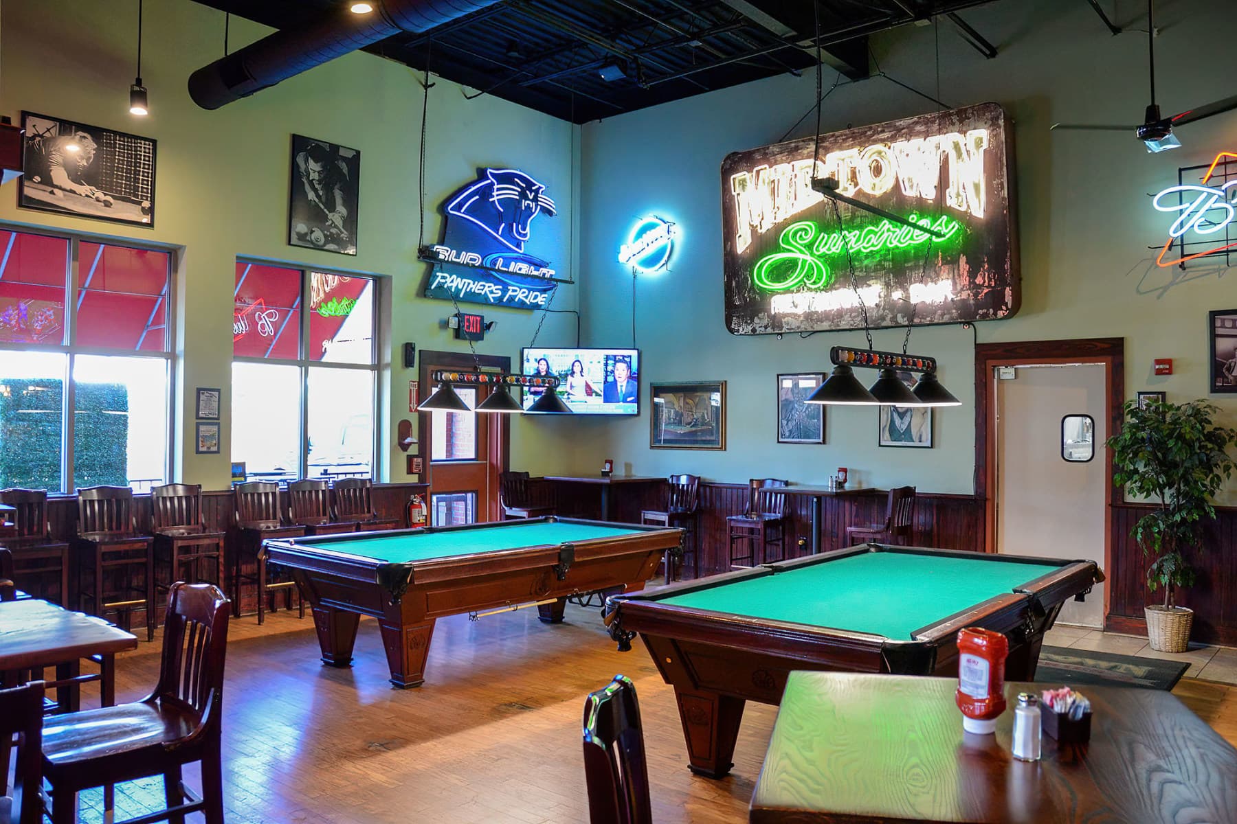 Interior dining area with patrons eating at tables
