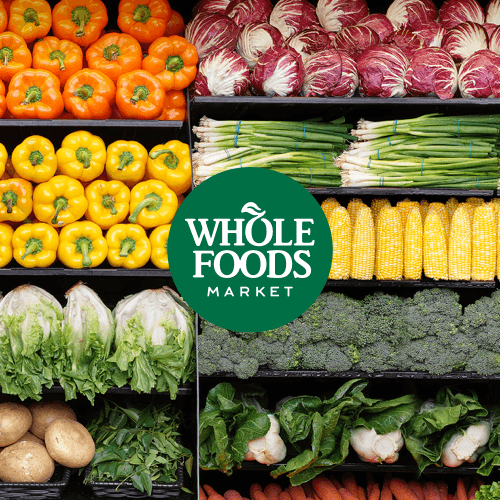 Fresh produce display with colorful vegetables at store