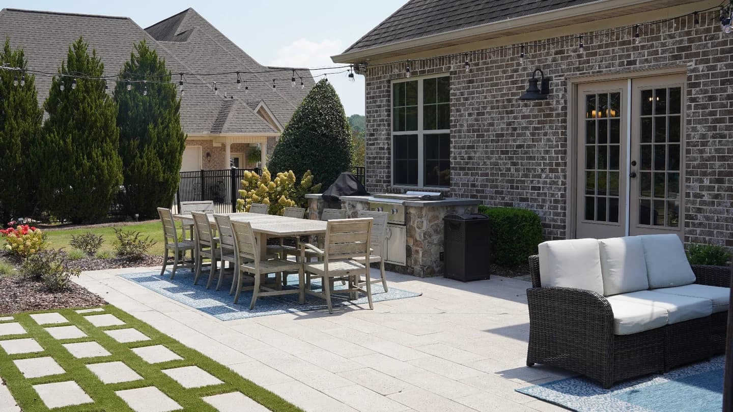 Backyard patio with dining and outdoor kitchen