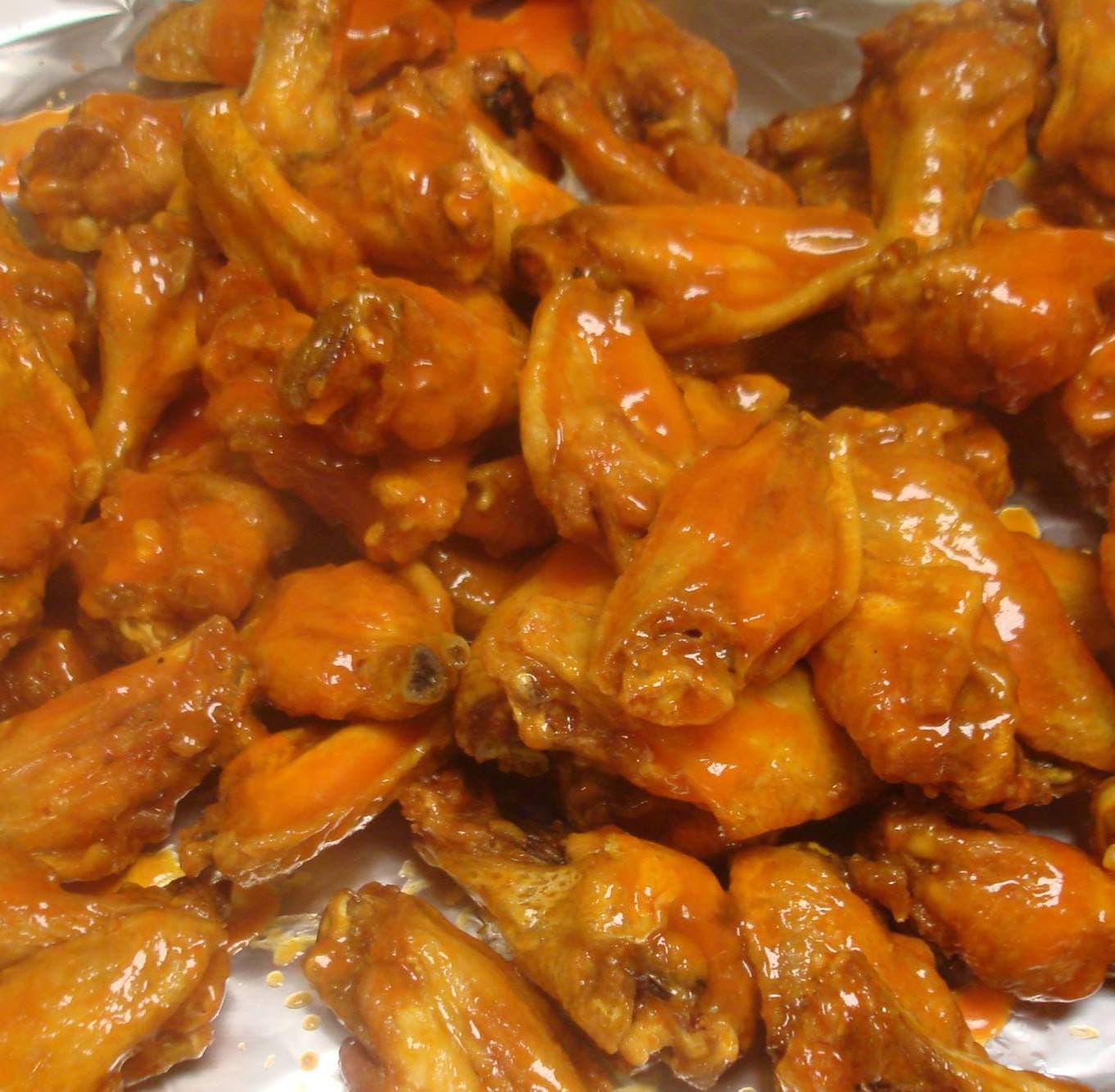 Chicken wings on white plate