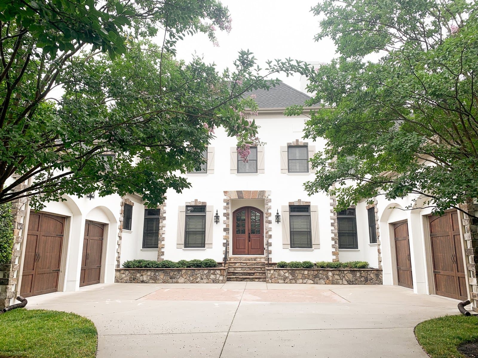 White house exterior with stone accents