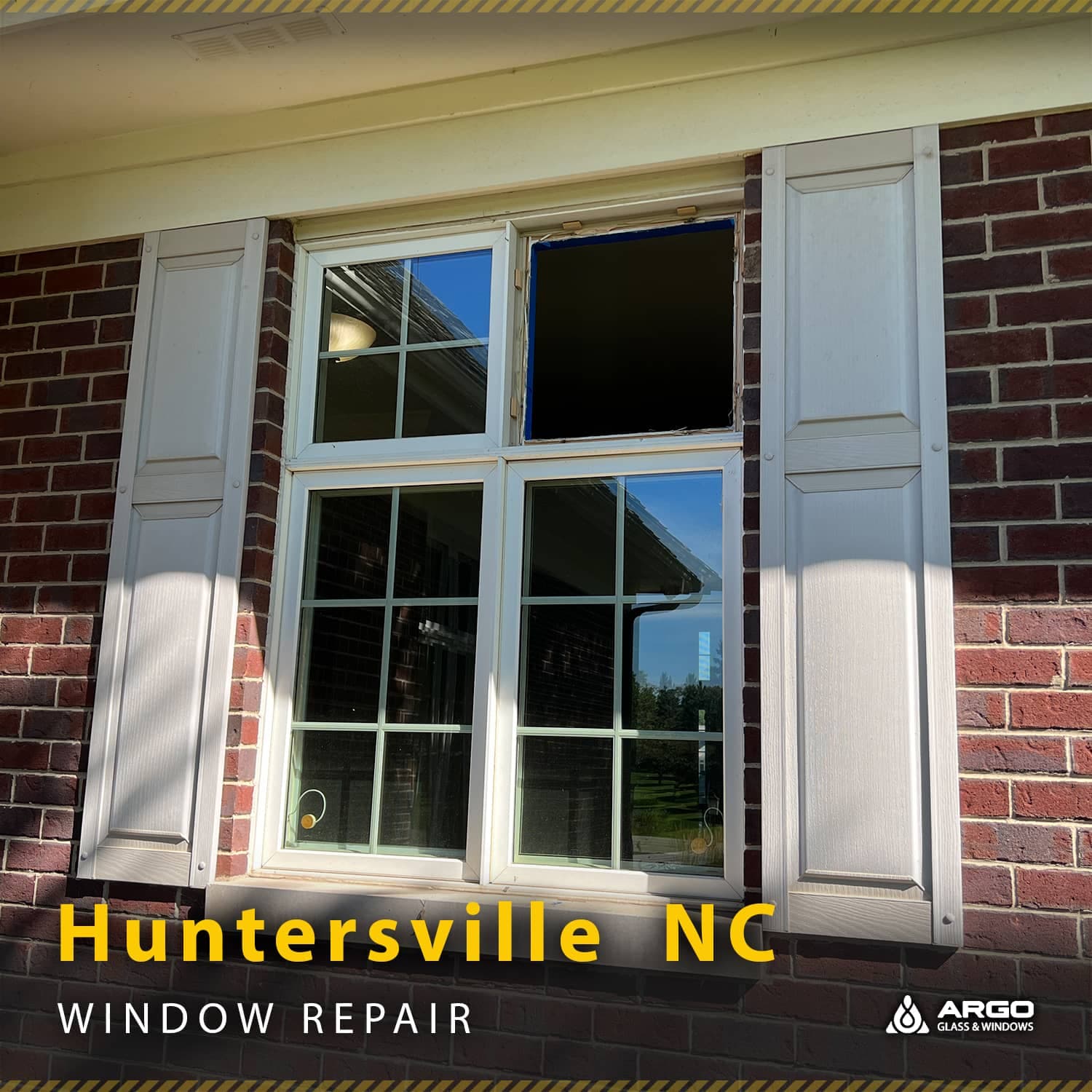Window repair work on brick building