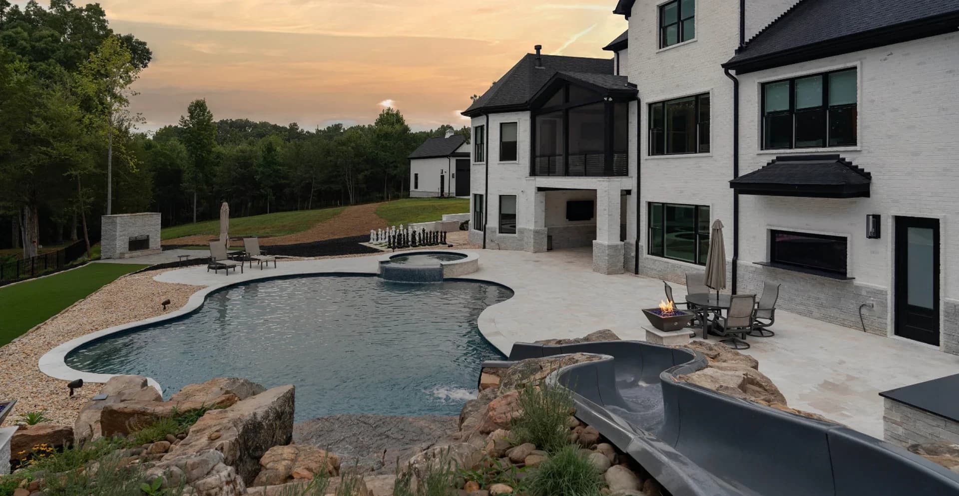 Modern home exterior with pool and patio