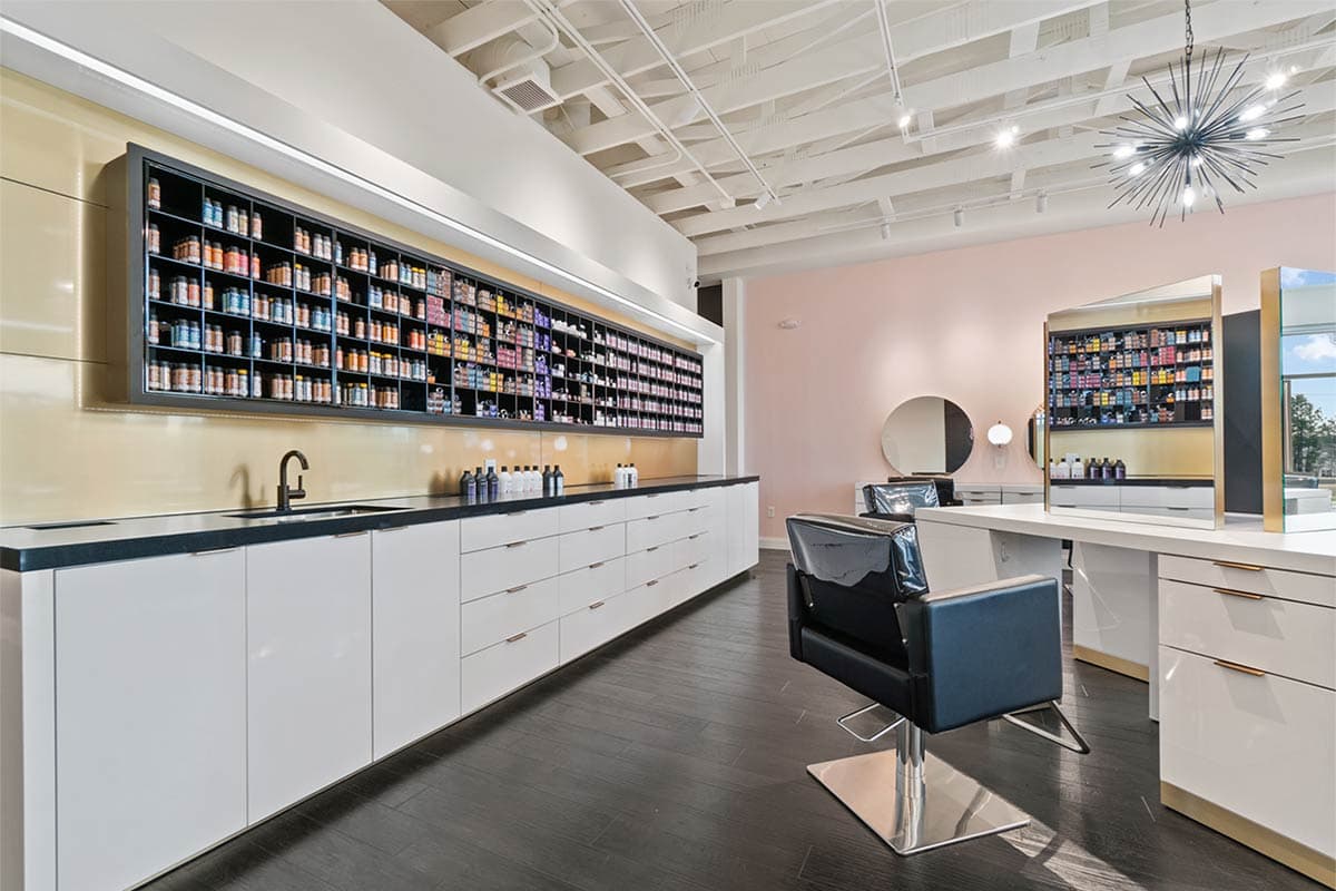 Modern salon interior with styling stations