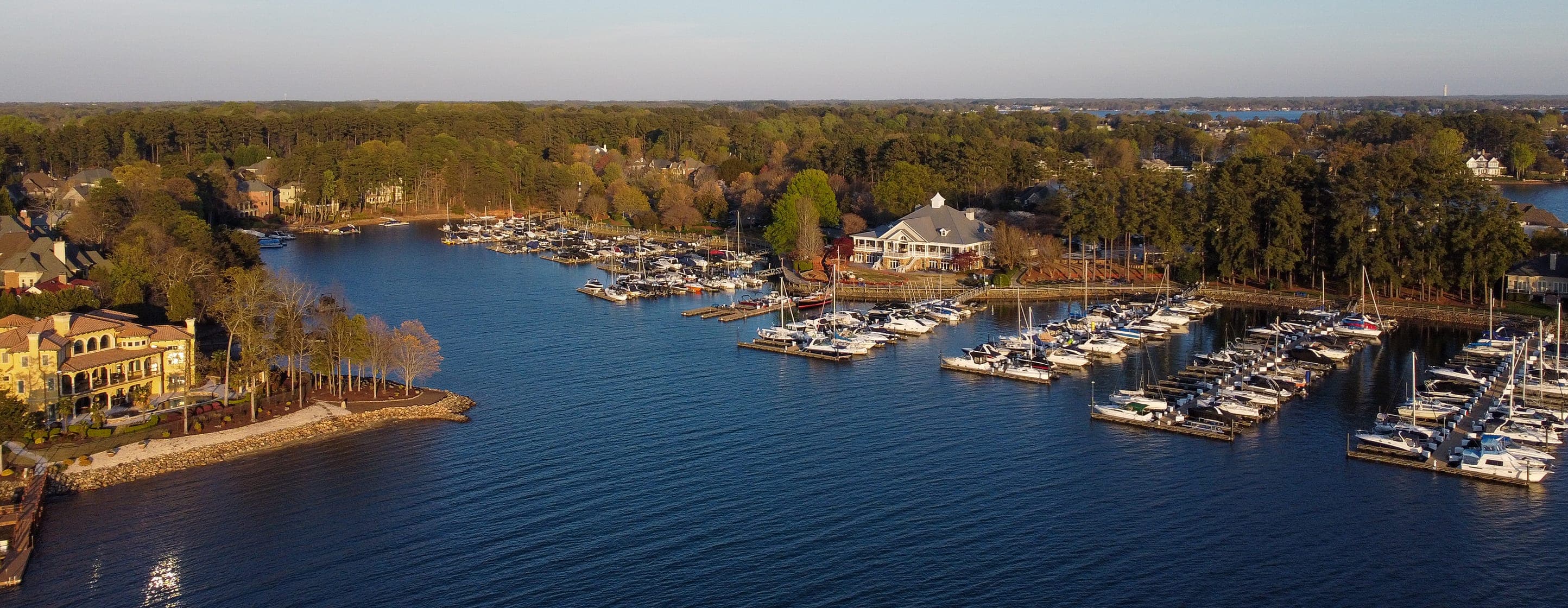 Marina with sailboats and waterfront building