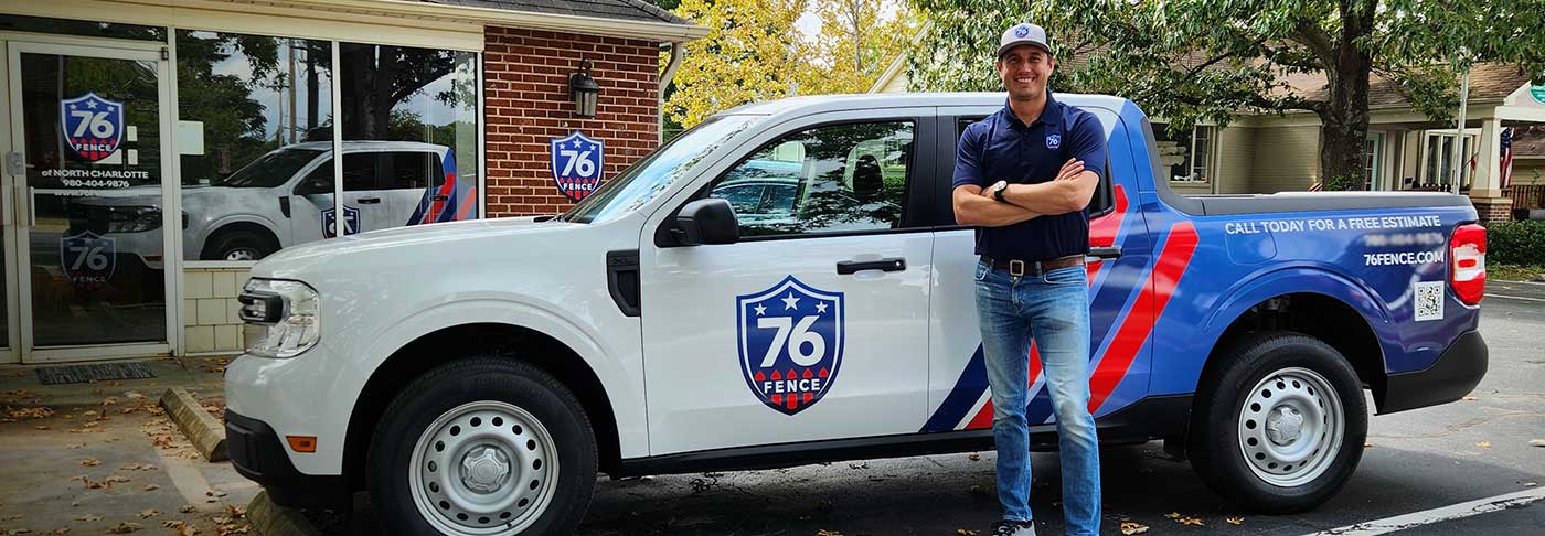 76 Fence work truck and employee