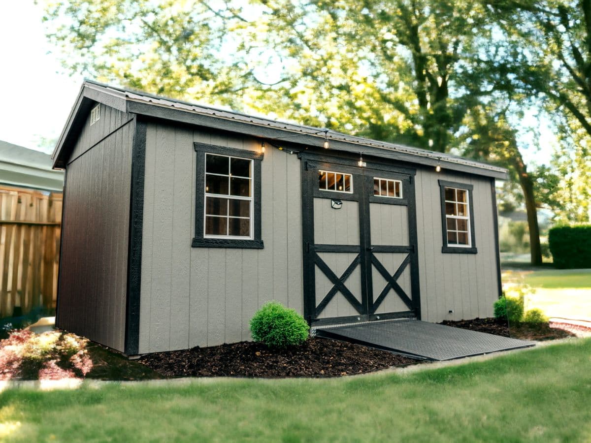 Gray shed with black trim and doors