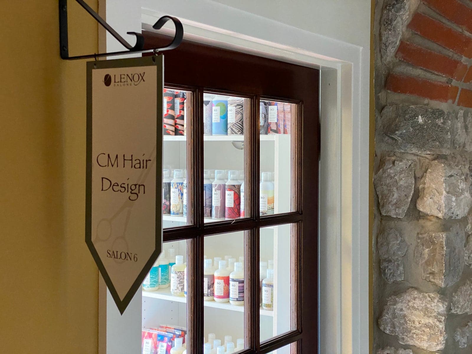 Salon interior with product display cabinet