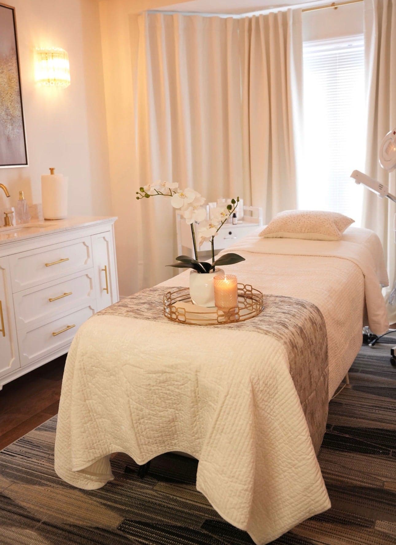 Spa treatment room with massage bed