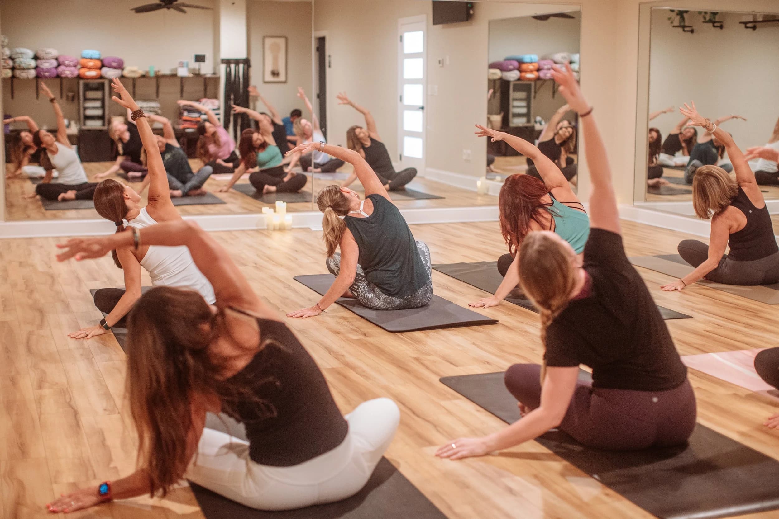 Indoor yoga class with mirrored studio