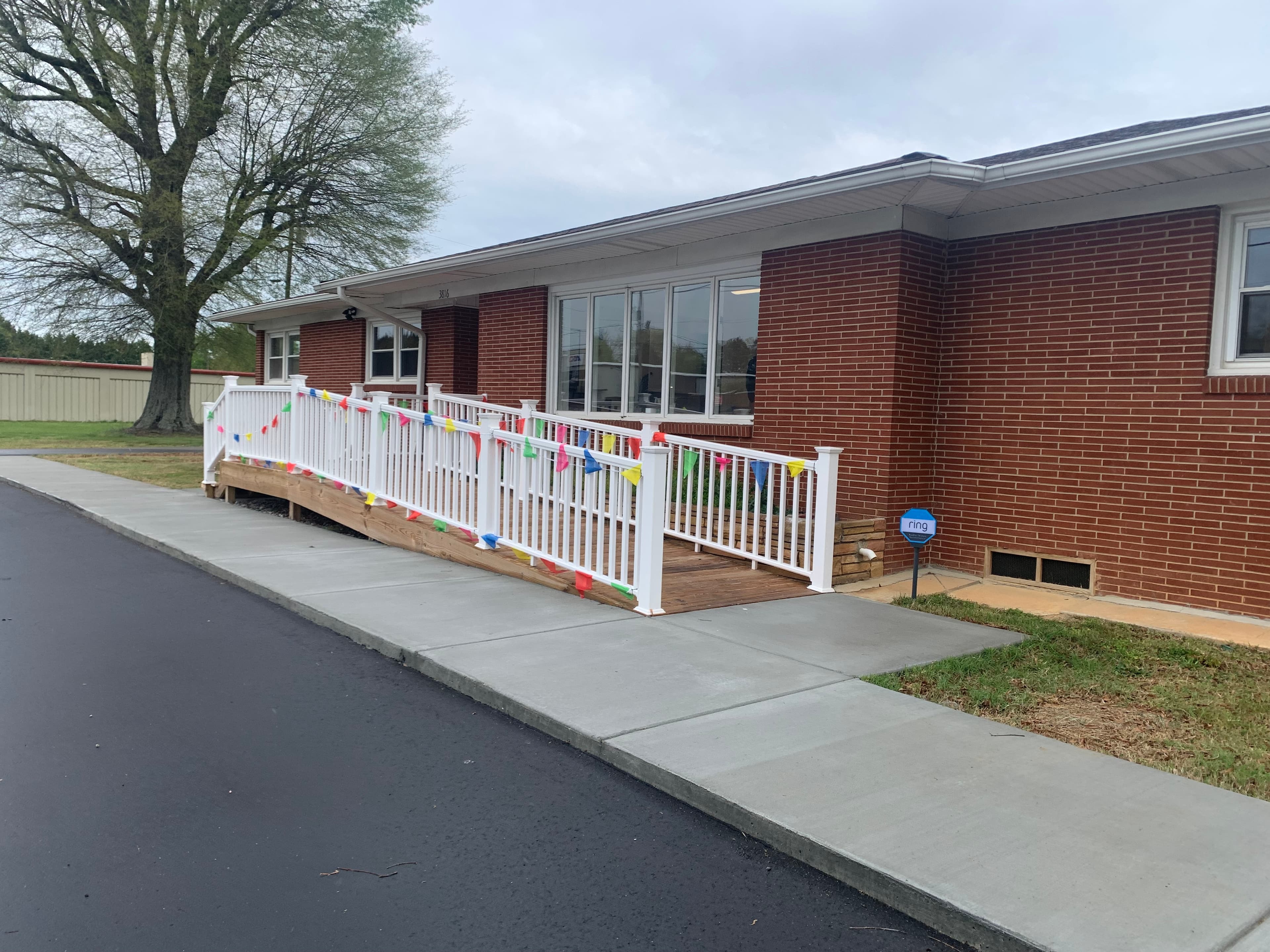 Pharmacy building exterior with ramp and entrance