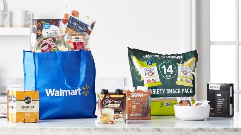 Walmart shopping bags with groceries and products