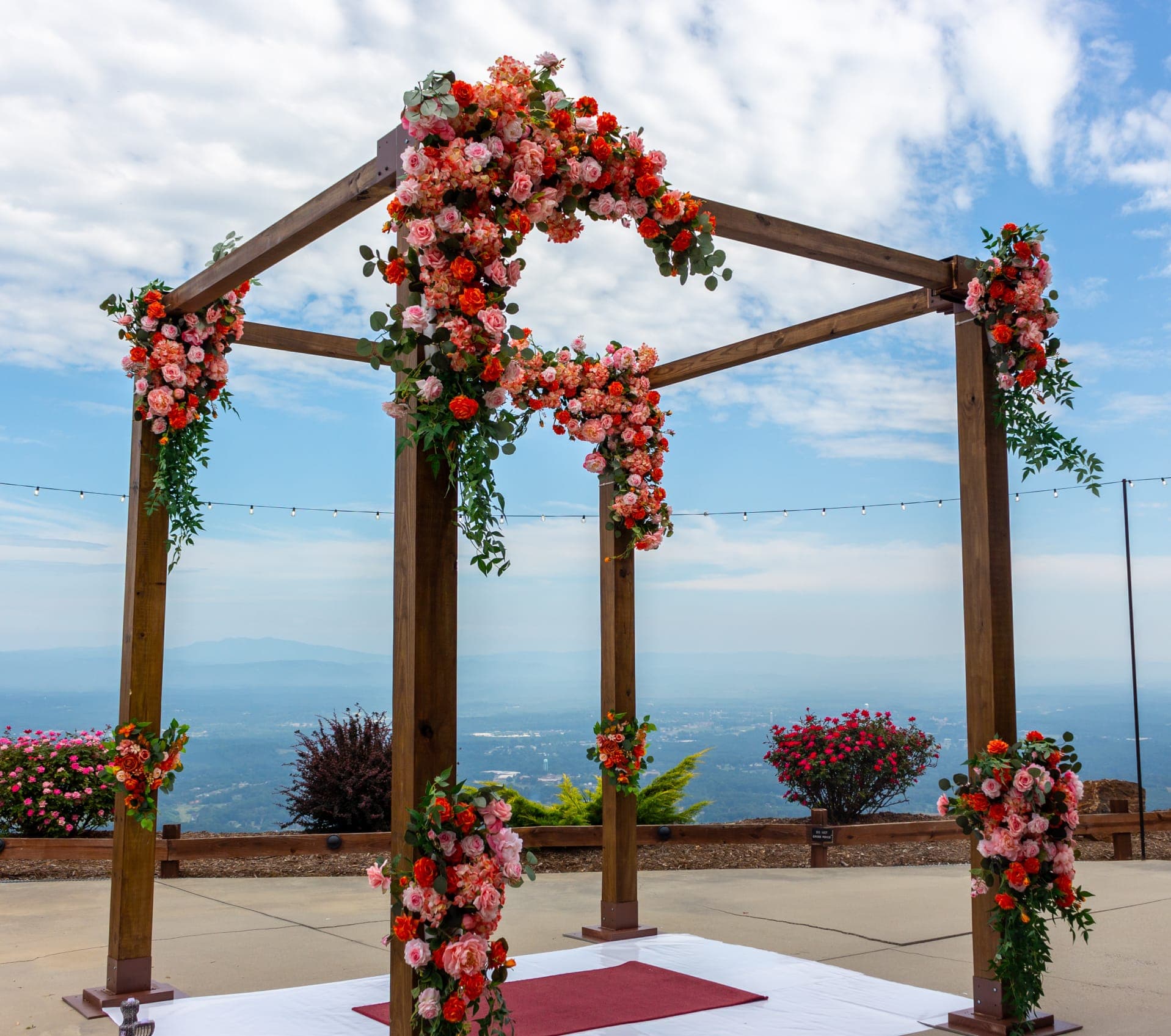 Wedding ceremony arbor with floral decorations