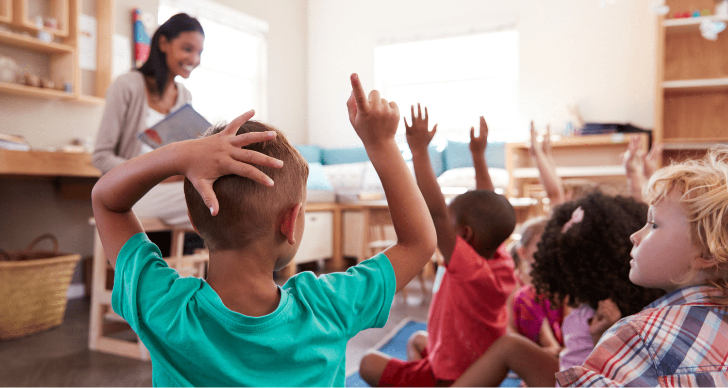 Preschool classroom with teacher and children