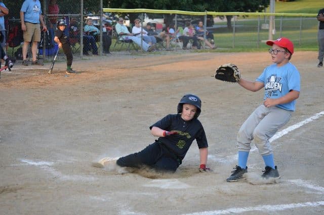 Youth softball game in progress