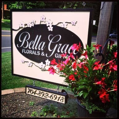 Storefront sign for Bella Grace Florals & Gifts