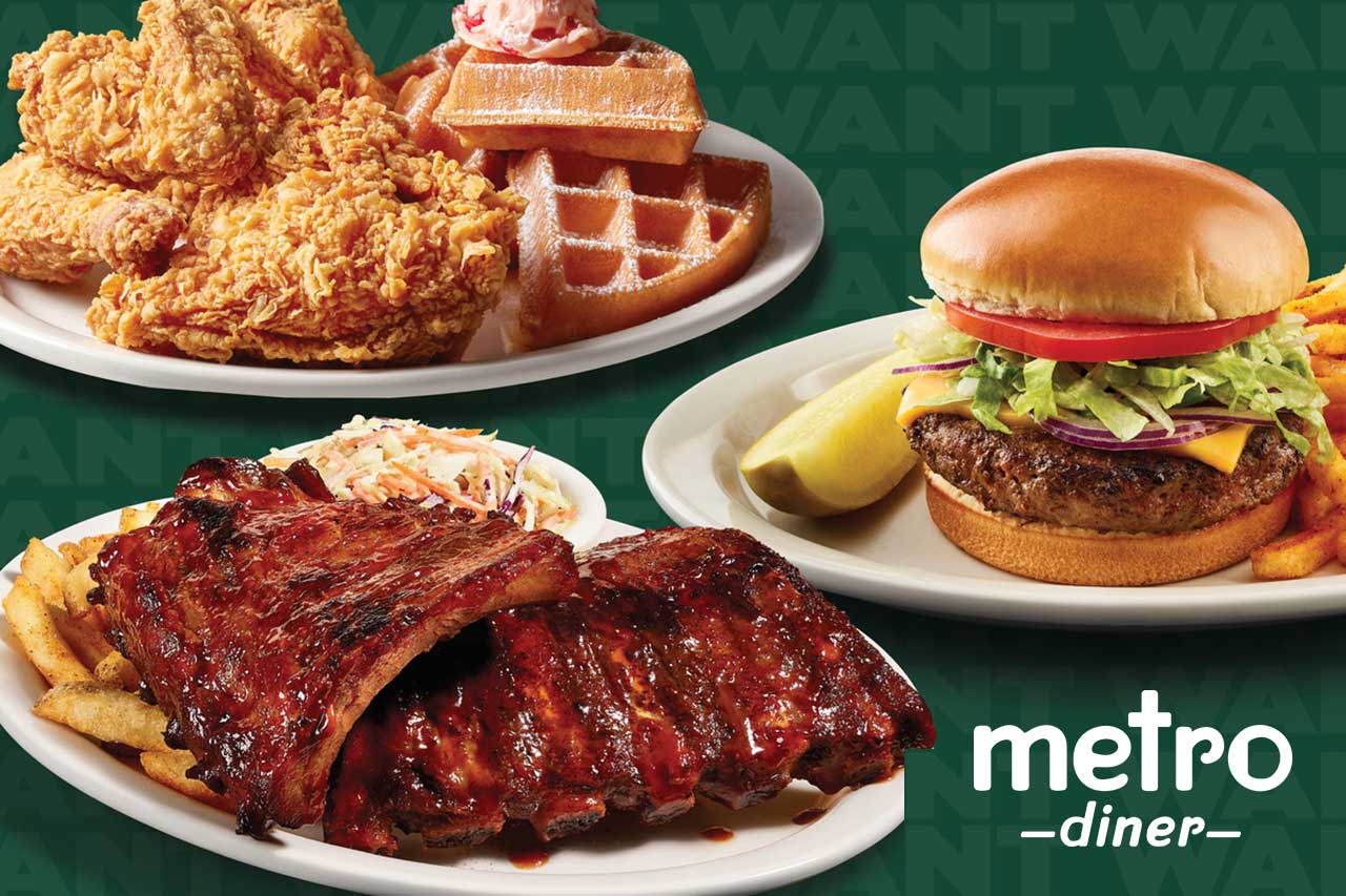 Plates of fried chicken, waffles, ribs, burger