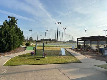 Driving range with golf nets and lights