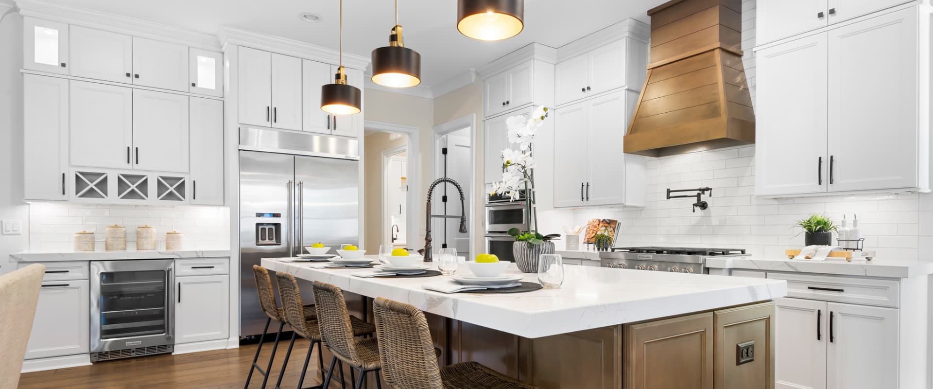 Modern white kitchen with island and seating