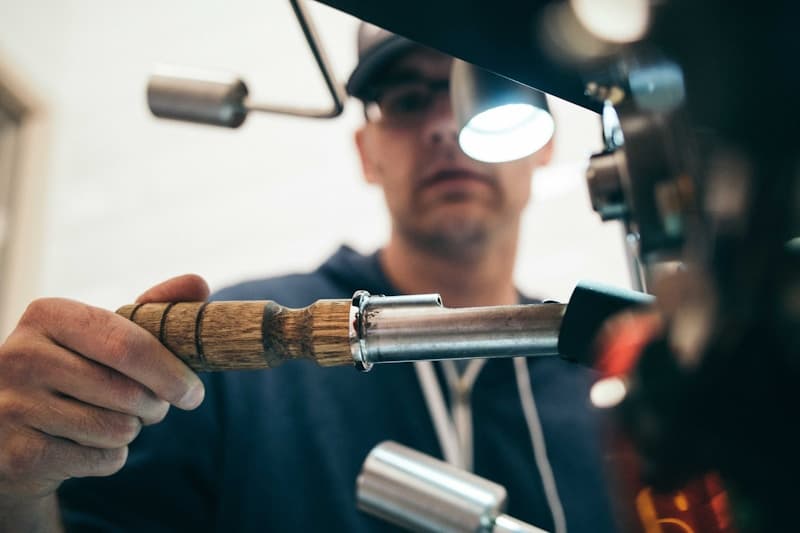Craftsman working on boat engine repair