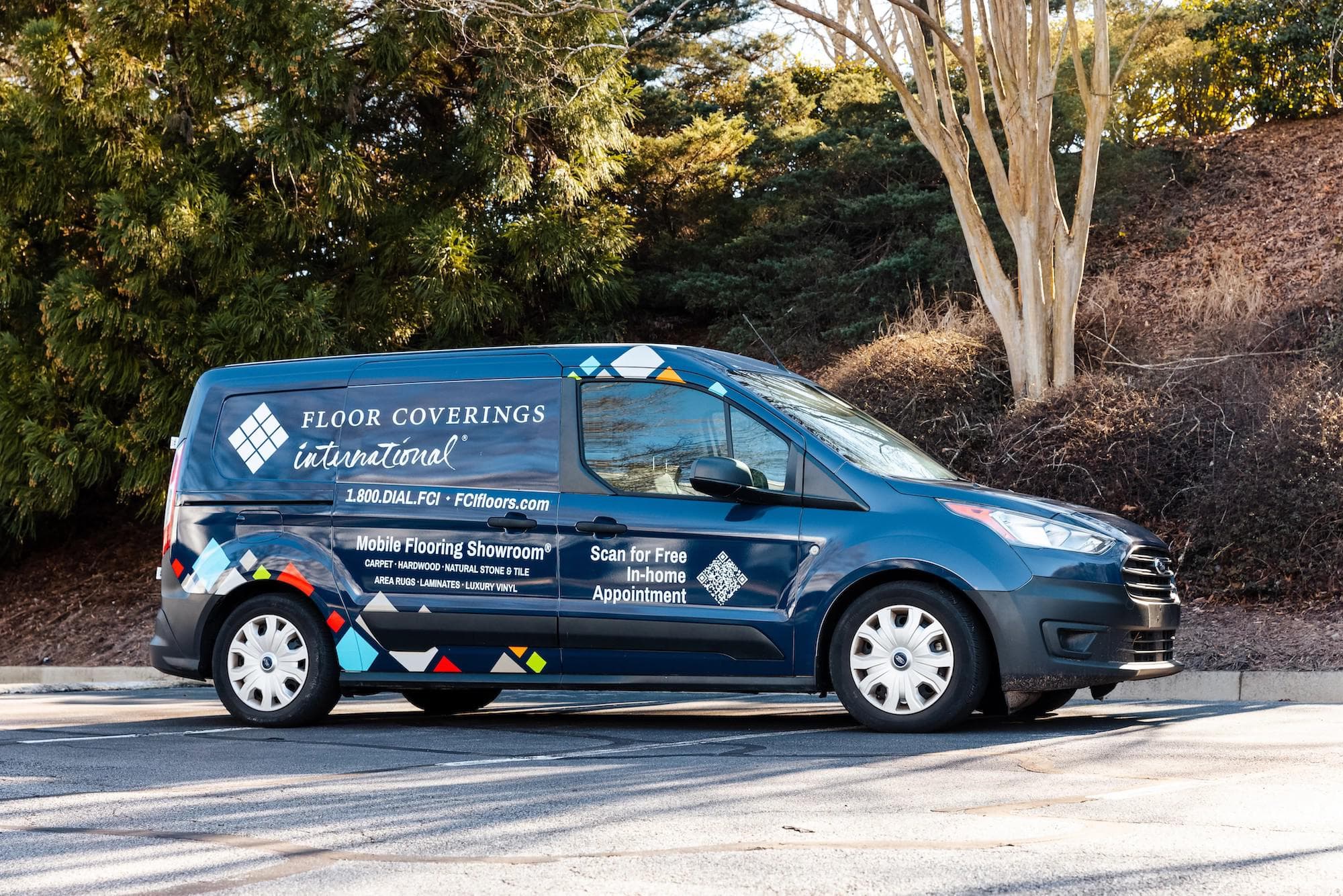 Mobile flooring showroom van with branding