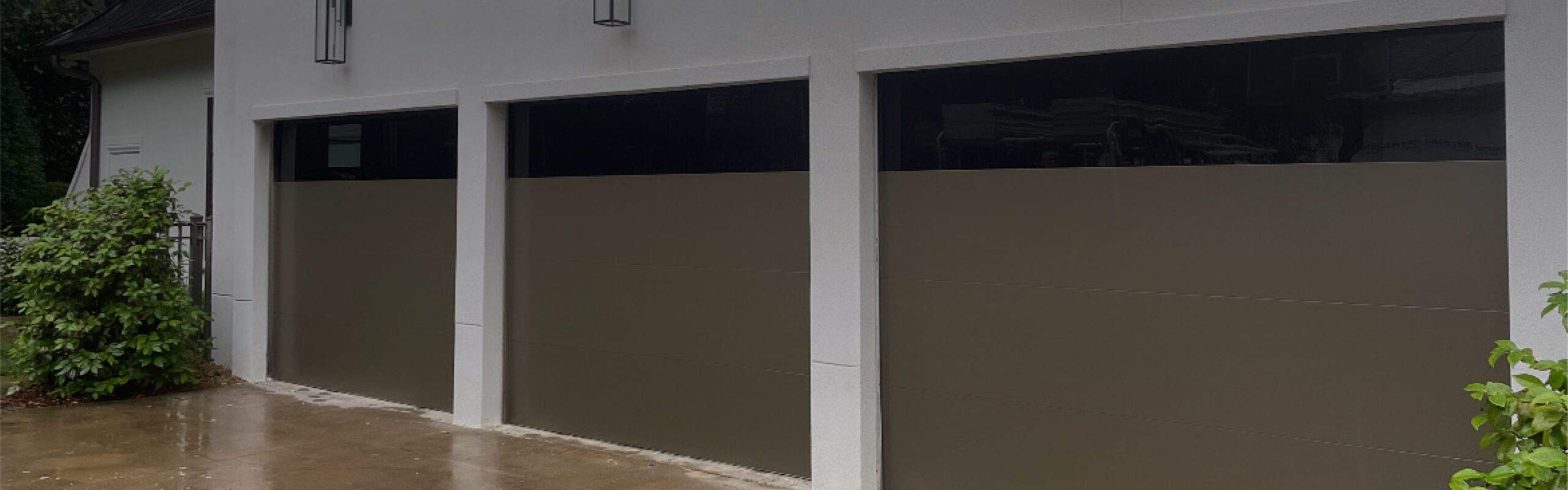 Modern garage doors with windows installed