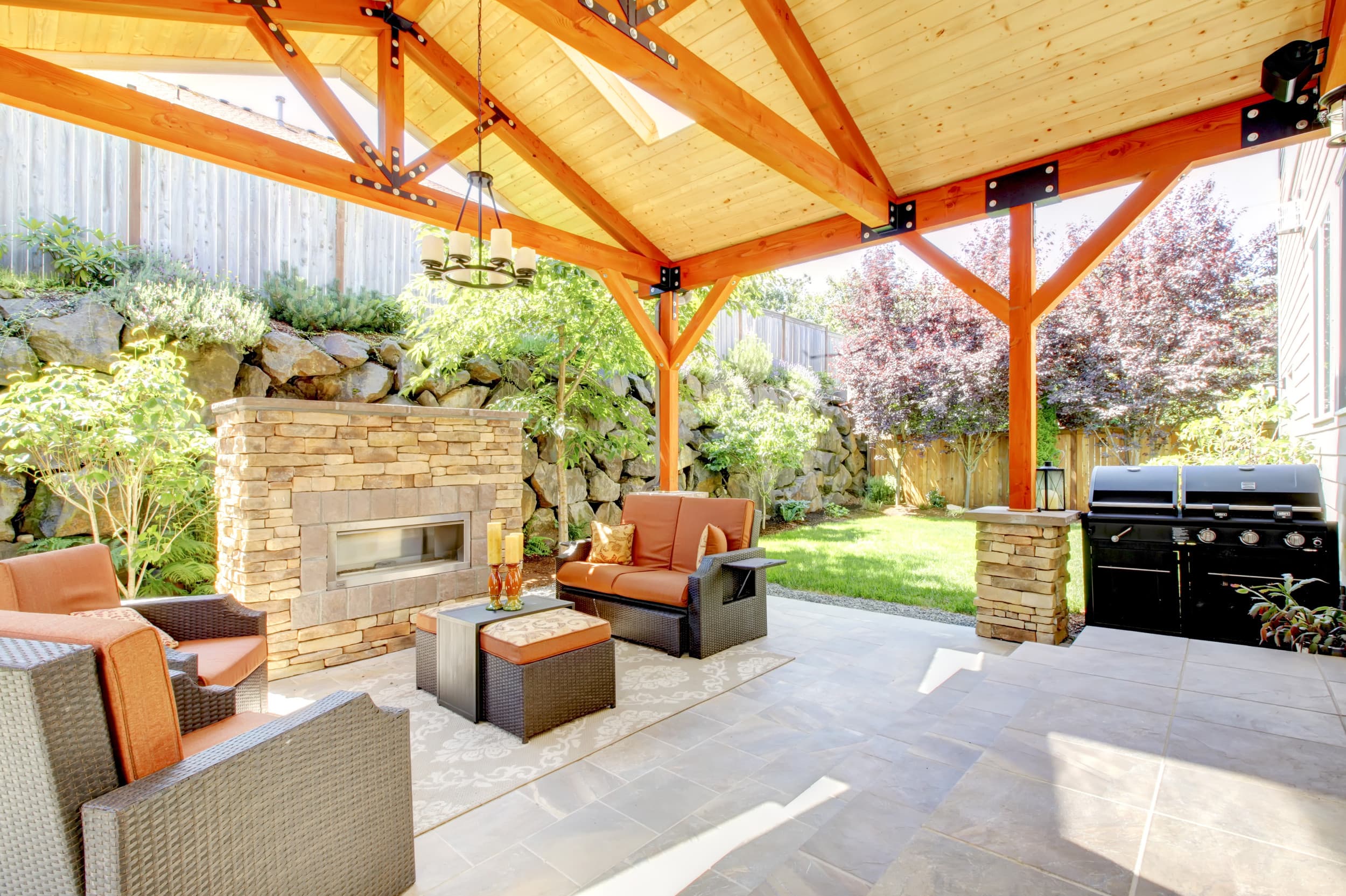 Outdoor patio with fireplace and pergola