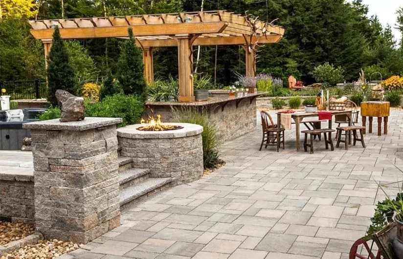 Outdoor patio with fire pit and seating area