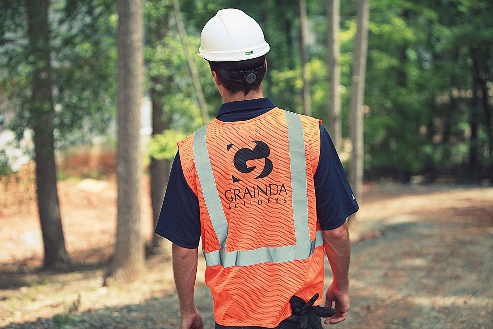 Construction worker on job site in safety gear