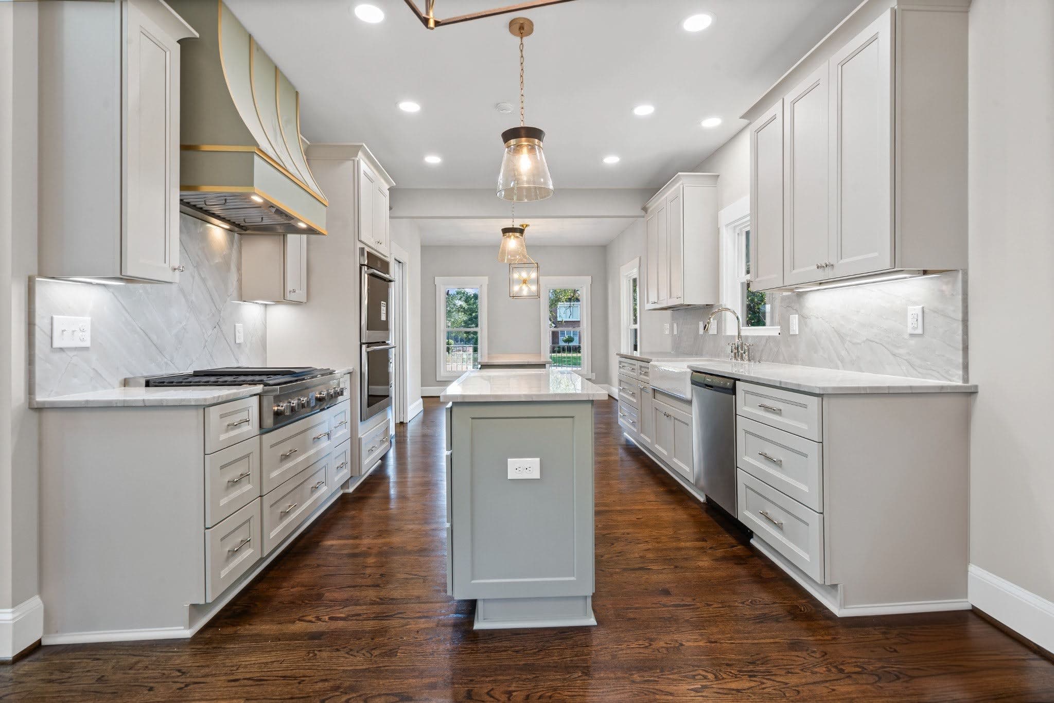 Modern kitchen with white cabinets and island