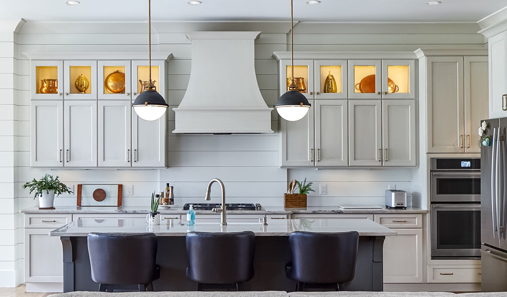 Modern kitchen with white cabinetry and island