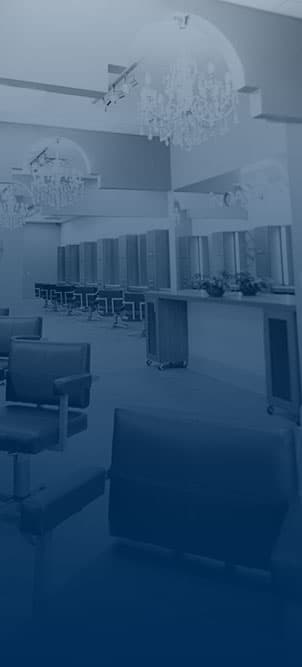 Interior salon with styling stations and chandeliers