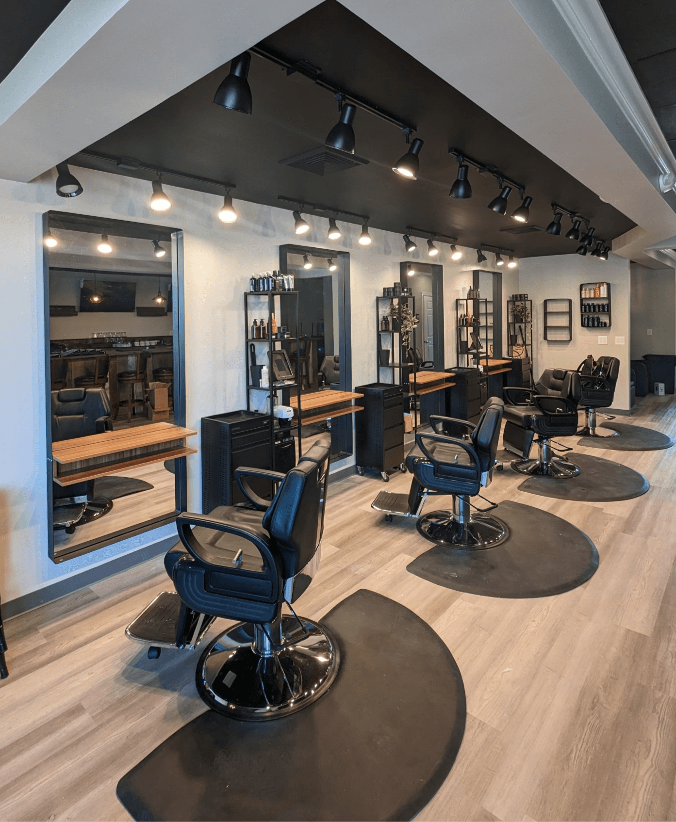 Interior of barbershop with styling stations