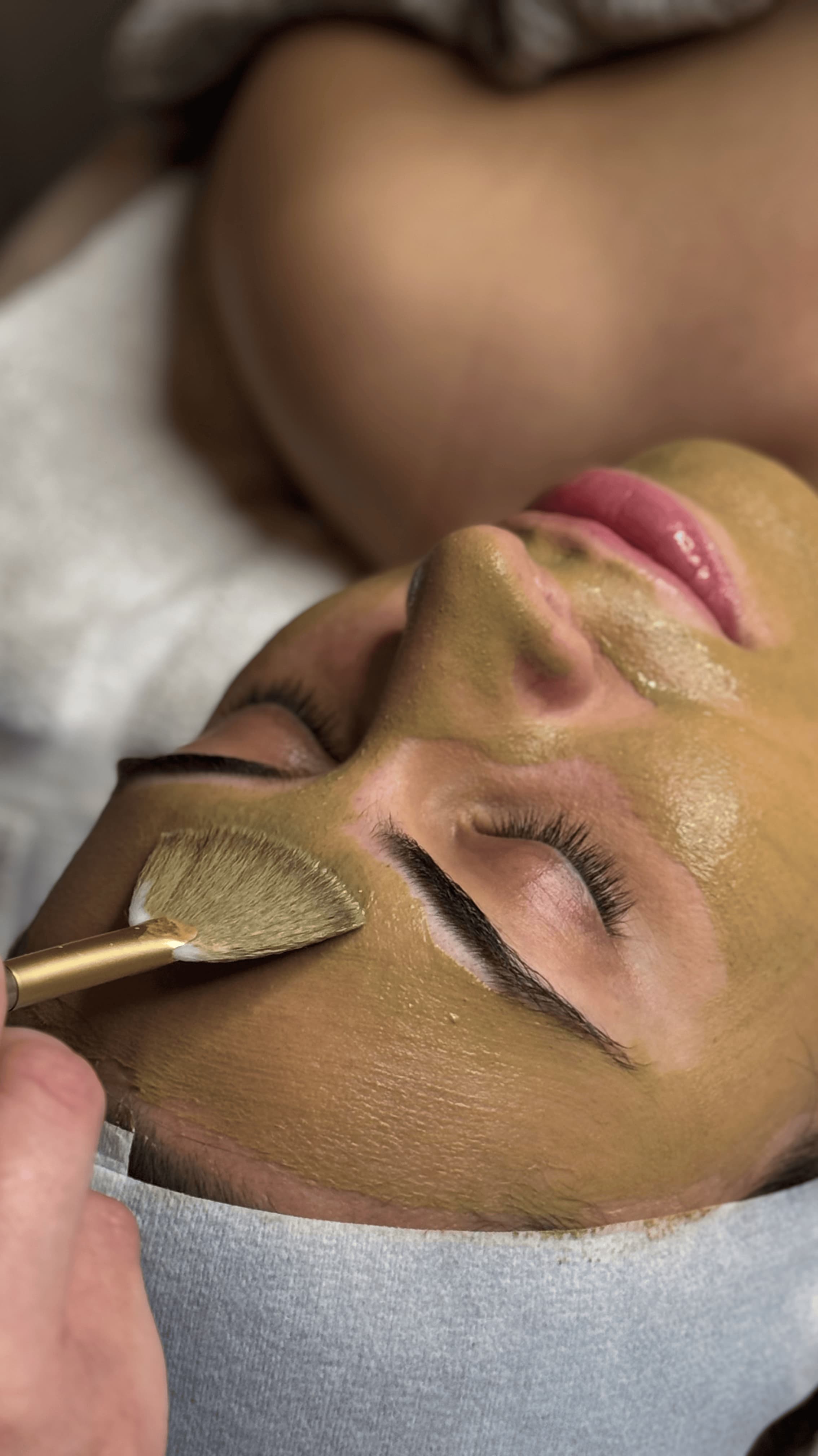 Facial treatment with brush application
