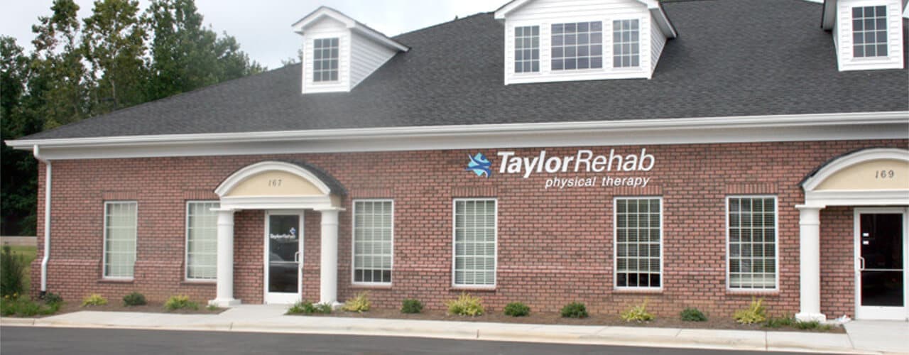 Physical therapy clinic brick building storefront