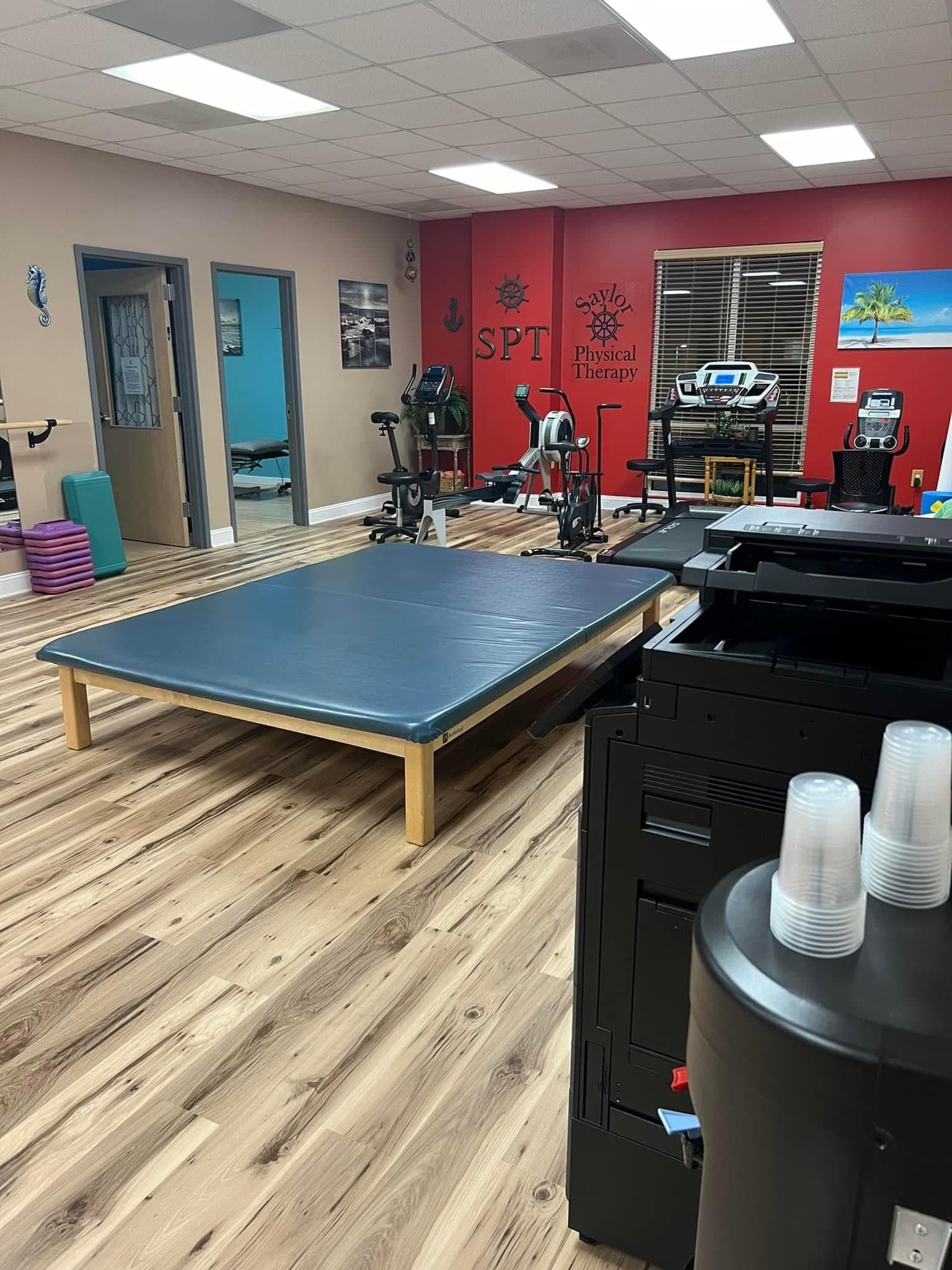 Interior with treatment table and exercise equipment