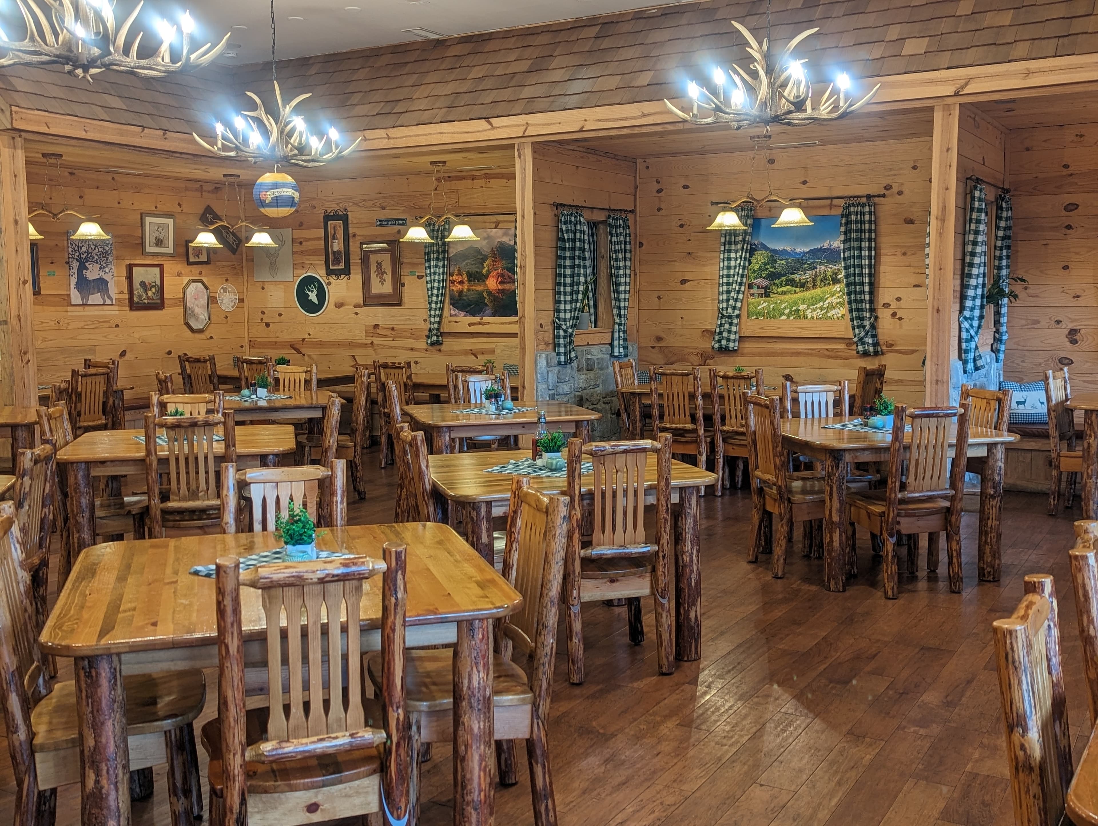 Restaurant interior with wooden tables and chairs