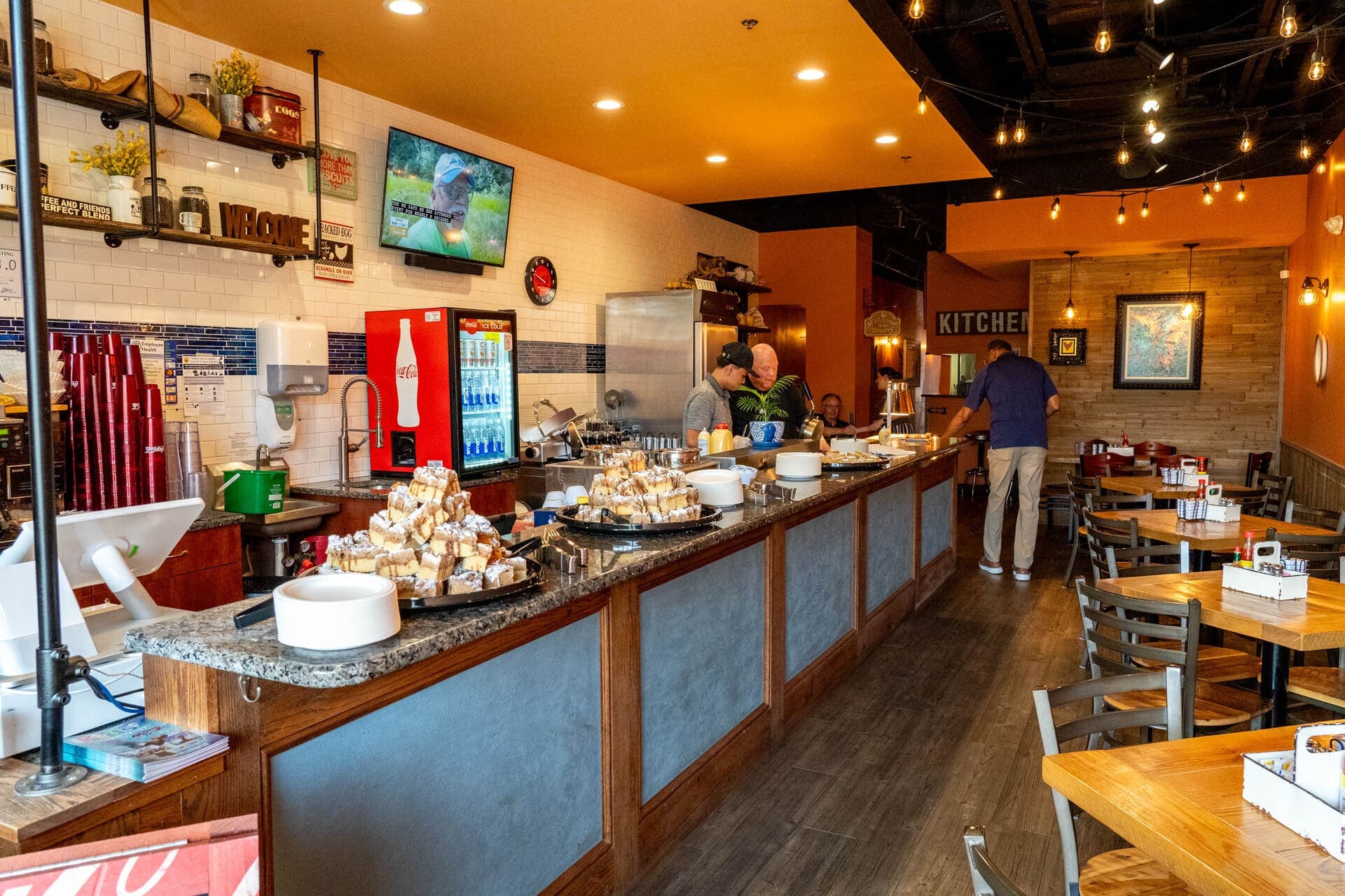 Interior counter and dining area with food displays