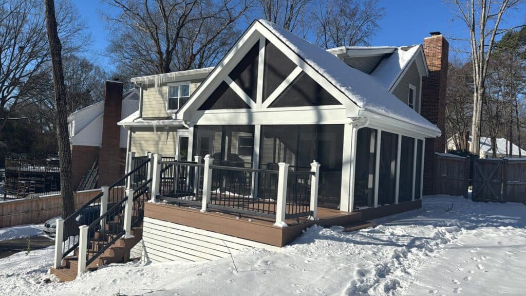 Home addition with covered porch and gable