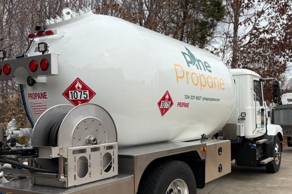 Pine Propane delivery truck with propane tank
