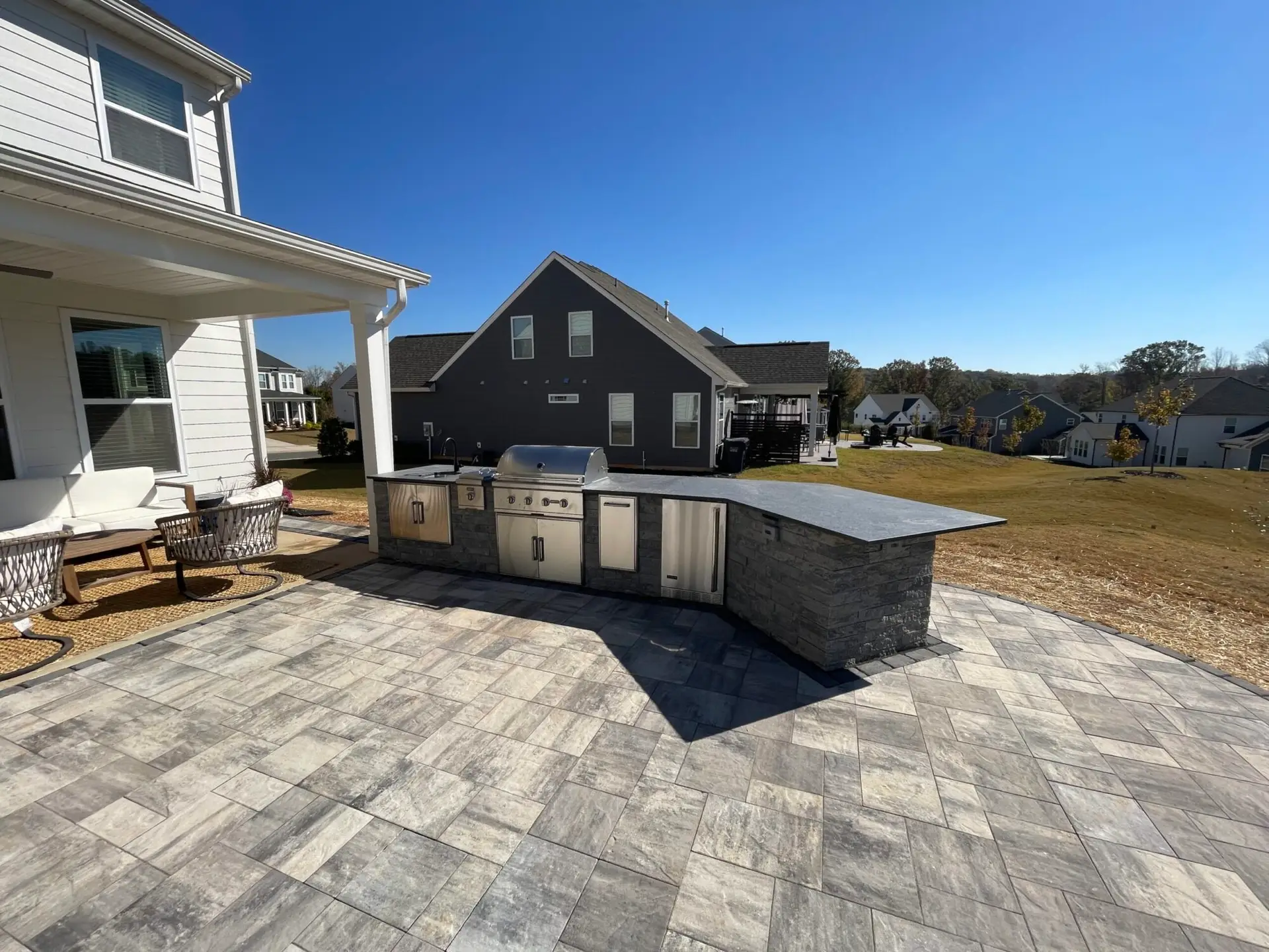 Outdoor kitchen and patio with grill
