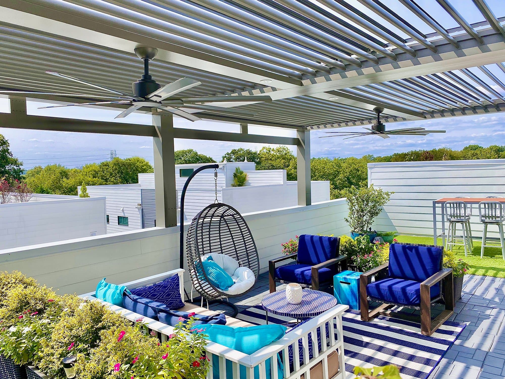 Residential patio with lounge seating and pergola