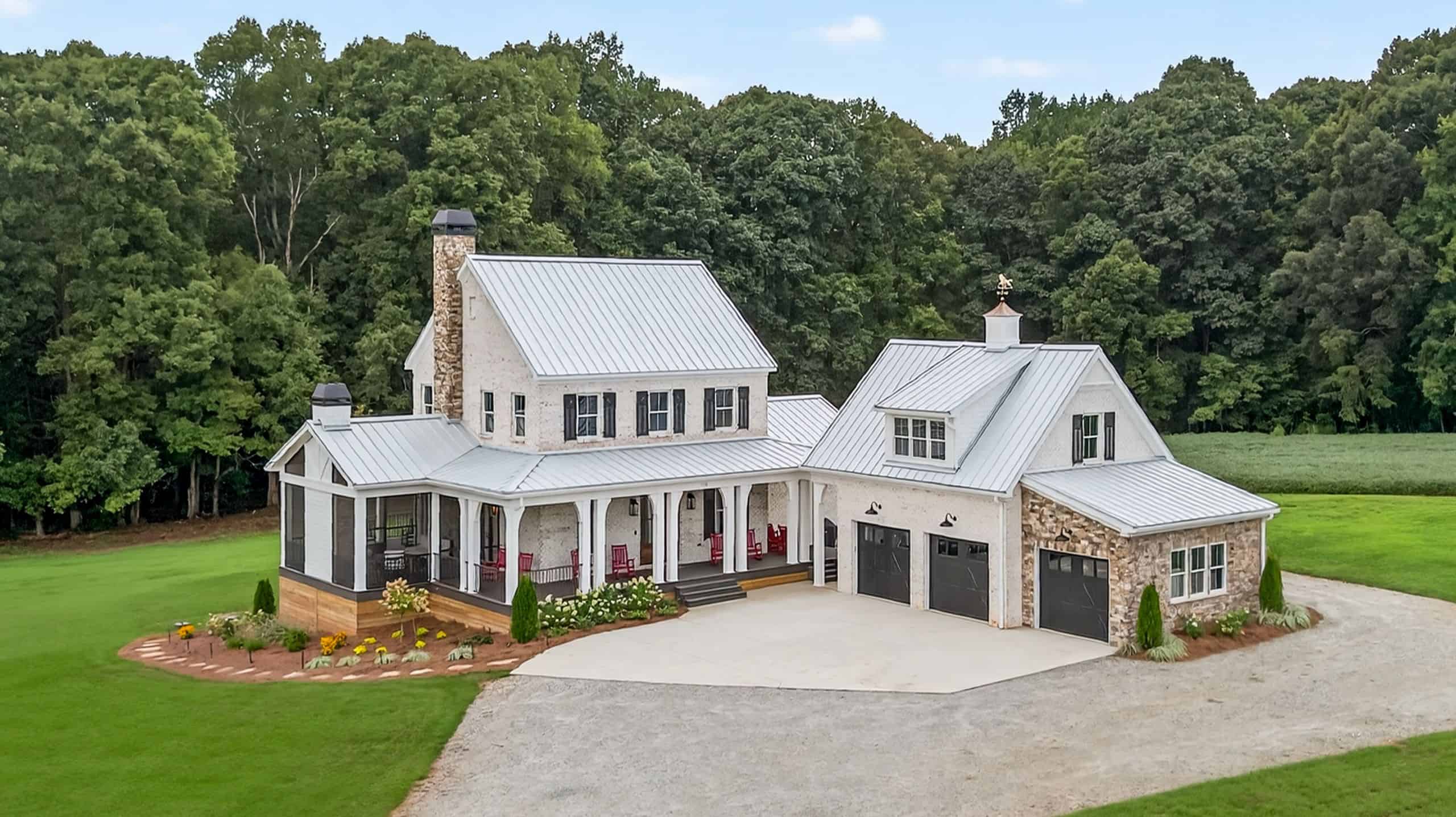 Modern farmhouse with metal roof and stone