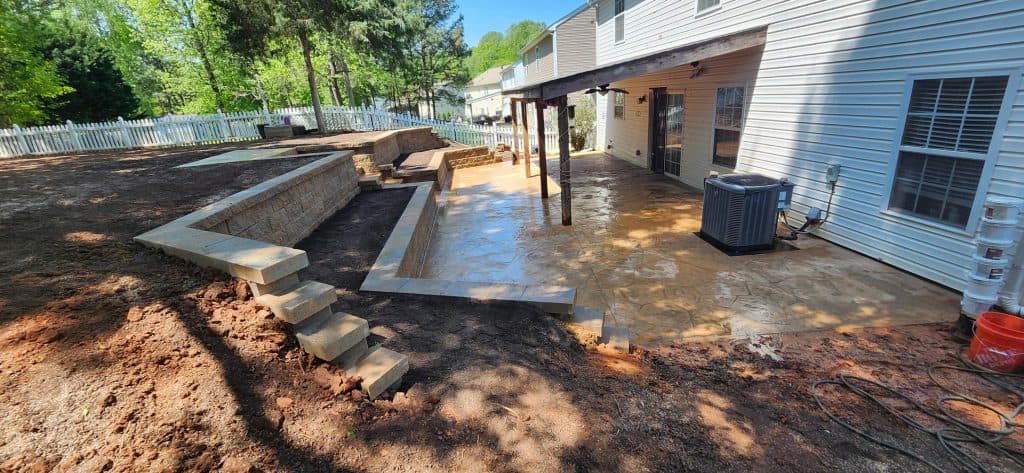 Stamped concrete patio installation work in progress