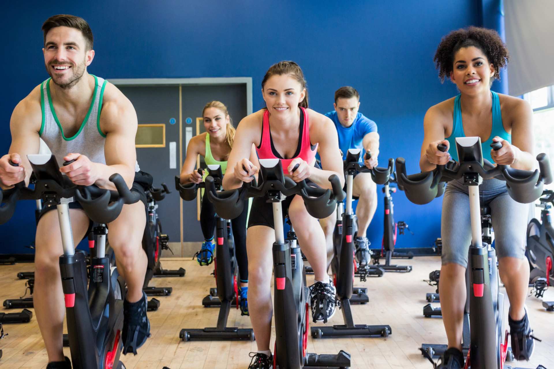 Group fitness class on stationary bikes