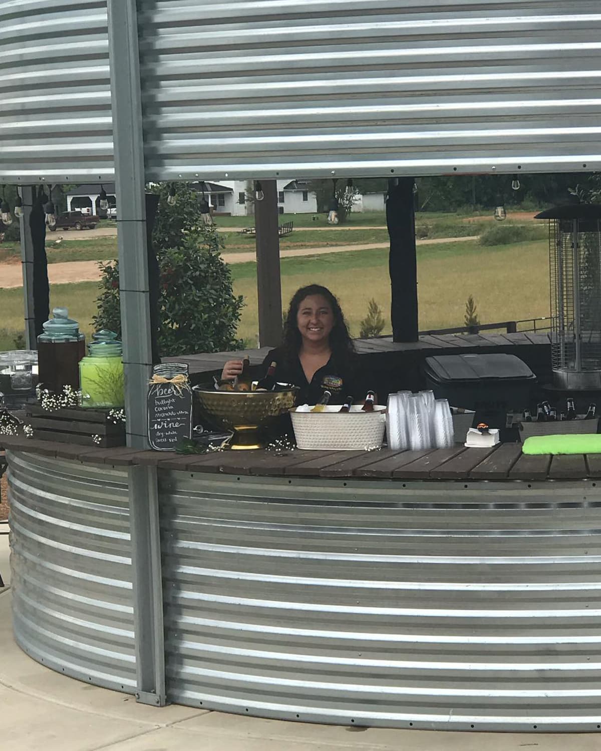 Woman working at outdoor catering setup