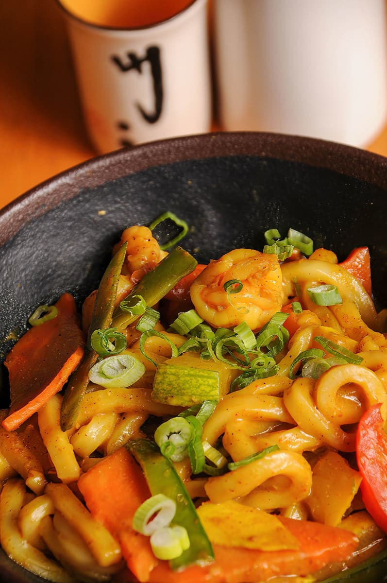 Asian noodle dish with peppers and scallions