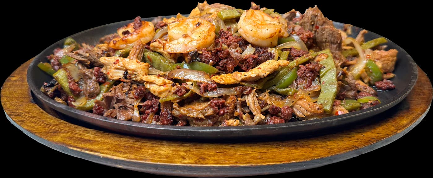 Fajita platter with shrimp, beef, and peppers